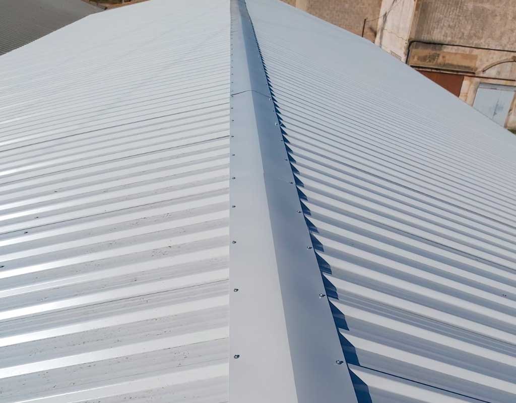 Reparación de goteras en nave industrial reparado